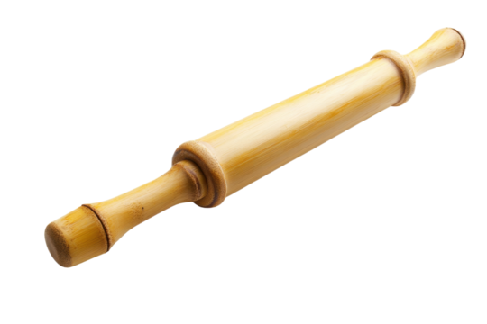 Wooden rolling pin rests on a clean surface, ready for baking in a cozy kitchen