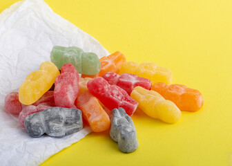 Colorful Jelly Babies on Yellow
