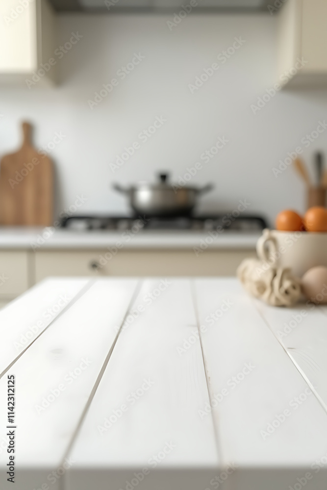 Poster a white wood tabletop is in sharp focus while the surrounding kitchen counter is blurred due to sele