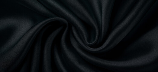 Black fabric background with a cross-sectional texture.