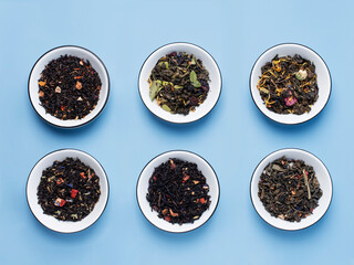 different types of tea in plates on a blue background
