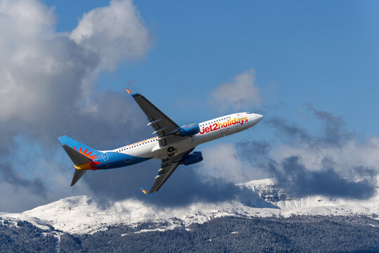 Geneva, Switzerland - december 15, 2024 : signs and logotype of a Boeing 737-800  of Jet2.com Limited a British low-cost airline take off from Geneva airport