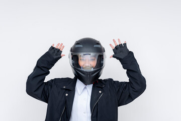 Motorcycle delivery rider with helmet and raised hands smiling on white background