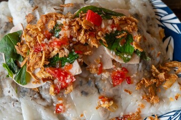 Vietnamese Banh Cuon Rice Rolls with Fried Shallots and Fresh Herbs