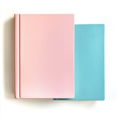 Two vibrant notebooks, one pink and one blue, stacked on a white background.