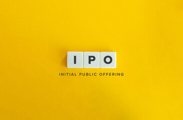 Initial Public Offering (IPO). Acronym on Block Letter Tiles on Yellow Background. Minimalist Aesthetics.