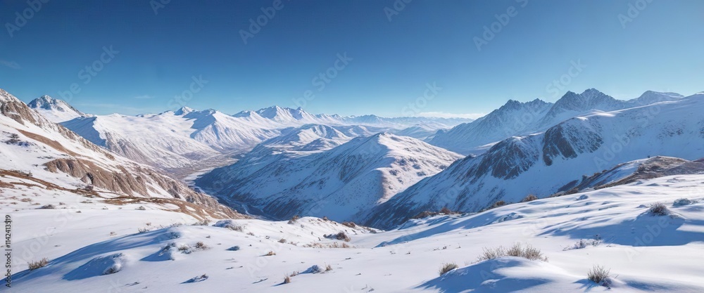 Wall mural Snow-covered hills and valleys under a clear blue sky, serene, nature