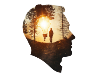 Silhouette of a person with nature and a light bulb inside, symbolizing inspiration.