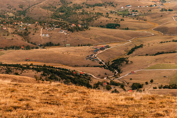 Fototapeta premium Landscape with Tiny Houses in Serbian Countryside
