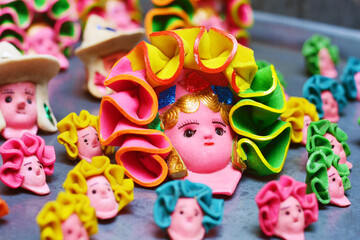 Masks for tantawawa - typical sweet bread for All Dead Day.