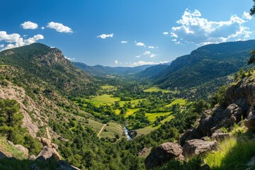 Obraz premium Vibrant Panoramic View of Lush Green Valley Landscape