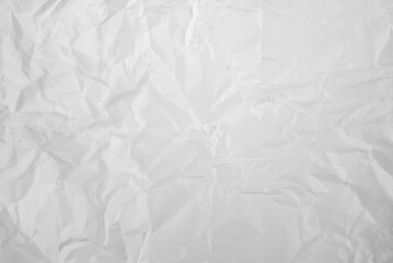 White recycled craft paper texture as background. Grey paper texture, Old vintage page or grunge vignette of old newspaper. Pattern rough art creased