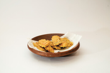 Delicious fried tempeh or fried tempeh is ready to eat, with a white background.