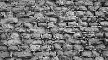 gray background, photo of gray brick wall close-up