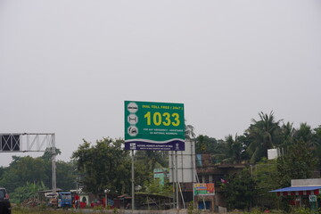 Toll free number board for Pedestrian safety in roadside
