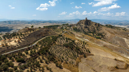 Aerial view of Craco, a ghost town in the province of Matera, Basilicata, Italy. The historic center was depopulated due to a landslide and has become a tourist destination.