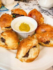 Baked dumplings stuffed with black pudding.