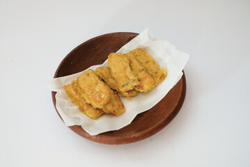 Delicious fried tempeh or fried tempeh is ready to eat, with a white background.