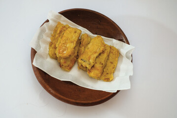 Delicious fried tempeh or fried tempeh is ready to eat, with a white background.