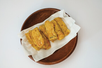 Delicious fried tempeh or fried tempeh is ready to eat, with a white background.