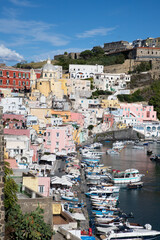 beautiful Procida island with colorful houses in sunny summer day, Italy