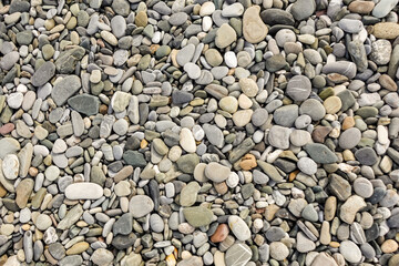 Stones, sea pebbles as a background, texture.