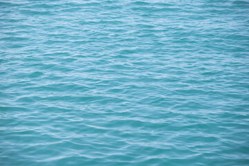 background of blue sea water in sunny weather nature.