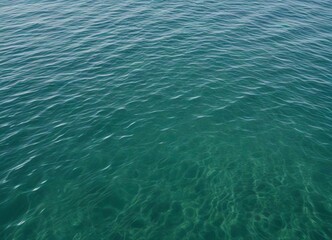 Obraz premium An aerial view of a vast expanse of calm ocean water