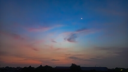 Fototapeta premium time lapse of clouds over sunset