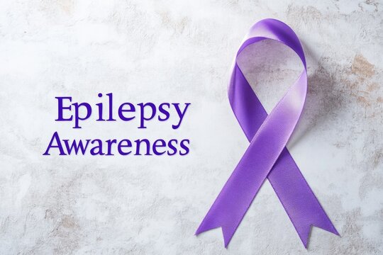 Purple ribbon on textured background for epilepsy awareness campaign