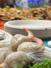 A sizeable pile of delicious shrimp resting atop a pristine white plate