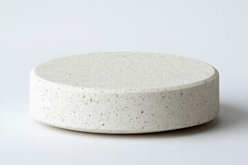 Round Decorative Stone Object on Light Background with Texture