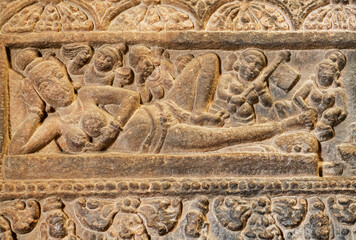 Massage for the Indian goddess on relief of an abandoned indian temple, India. 