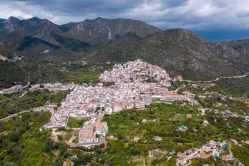 Aerial drone view of typically white Spanish village OJEN. Situated close Marbella city, in the...