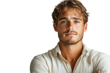 Obraz premium A confident young man with styled hair, wearing a casual shirt, poses thoughtfully with arms crossed against a white background.