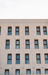 House with identical windows against the sky