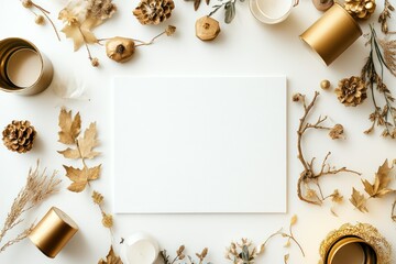 Elegant flat lay composition featuring seasonal decorations in gold and natural tones, including pine cones, leaves, and assorted plant elements on a white background.