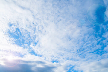 Fototapeta premium Blue sky and clouds, sweeping vast blue sky background with cumulus clouds in early morning