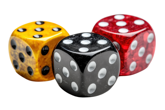 Three colorful dice featuring yellow, black, and red designs with white pips, isolated on a white background. Perfect for game night.