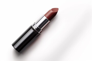 Obraz premium Lipstick in color of mocha mousse on white background. 