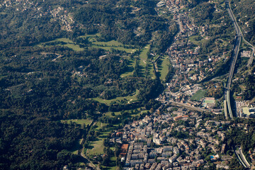 Fototapeta premium Rapallo Village near Genoa Aerial view cityscape from airplane view of golf course
