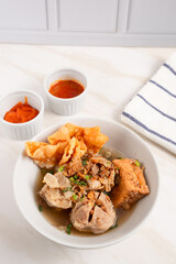 Bakso Arema, Meatballs Food Special from Malang East Java Indonesia. Close Up. Served with Soy Sauce, Sauce, and Chilli Paste