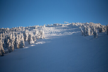 Pilsko Ski Resort, located on the border of Slovenia and Poland, offering scenic slopes and views