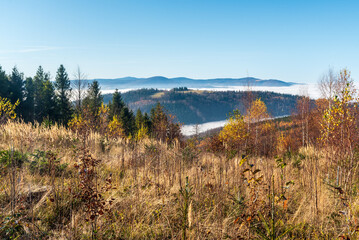 Moravskoslezske Beskydy mountains from forest glade bellow Velky Sosov hill summit in autumn...