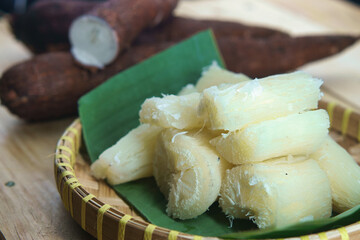Freshly Prepared Boiled Cassava Root Served on a Wooden Table