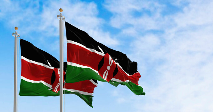 National flags of Kenya waving on a clear day