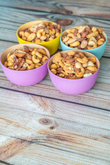 Bowls of assorted nuts ready to eat