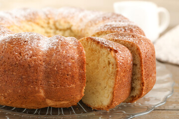 Freshly baked sponge cake on table, closeup