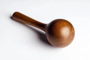 A beautifully crafted wooden tool with a round head and slender handle. This object highlights the elegance of woodwork. Perfect for artistic expression and decor. Generative AI