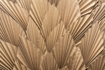 Origami inspired paper design in soft beige tones and intricate folds